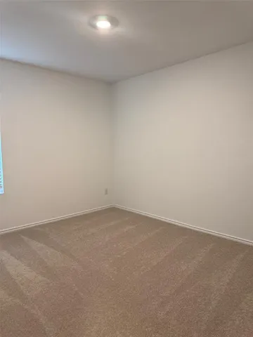 a bathroom with a granite countertop toilet a sink and a bathtub