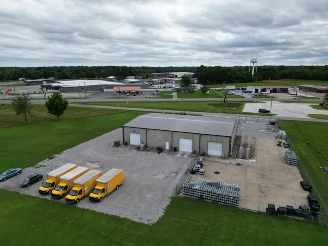 a view of a park with large trees