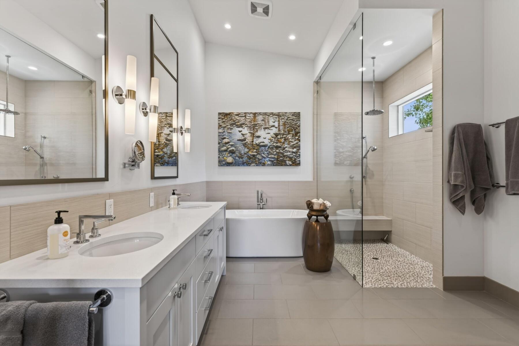 61487 Hackleman Court Bend, OR 97702 - Photo 21 of 35 a bathroom with a double vanity sink mirror and bathtub