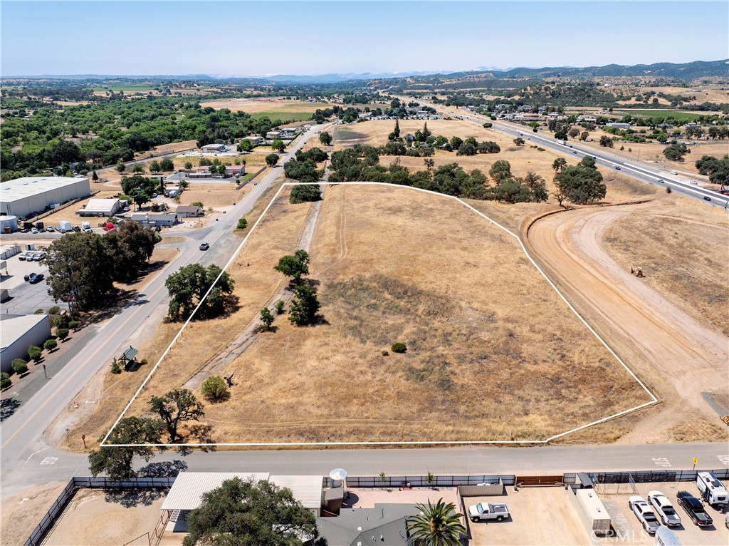 6229 Monterey Road Paso Robles, CA 93446 - Photo 3 of 9 an aerial view of residential houses with outdoor space