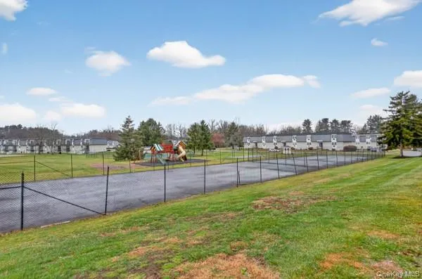 a view of a garden and swimming pool