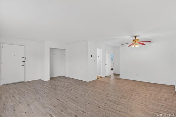 15 White Gate Road, Unit D Wappingers Falls, NY 12590 - Photo 4 of 16 a view of empty room with wooden floor