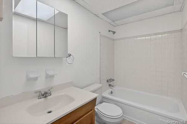 15 White Gate Road, Unit D Wappingers Falls, NY 12590 - Photo 9 of 16 a bathroom with a bathtub shower sink vanity and toilet