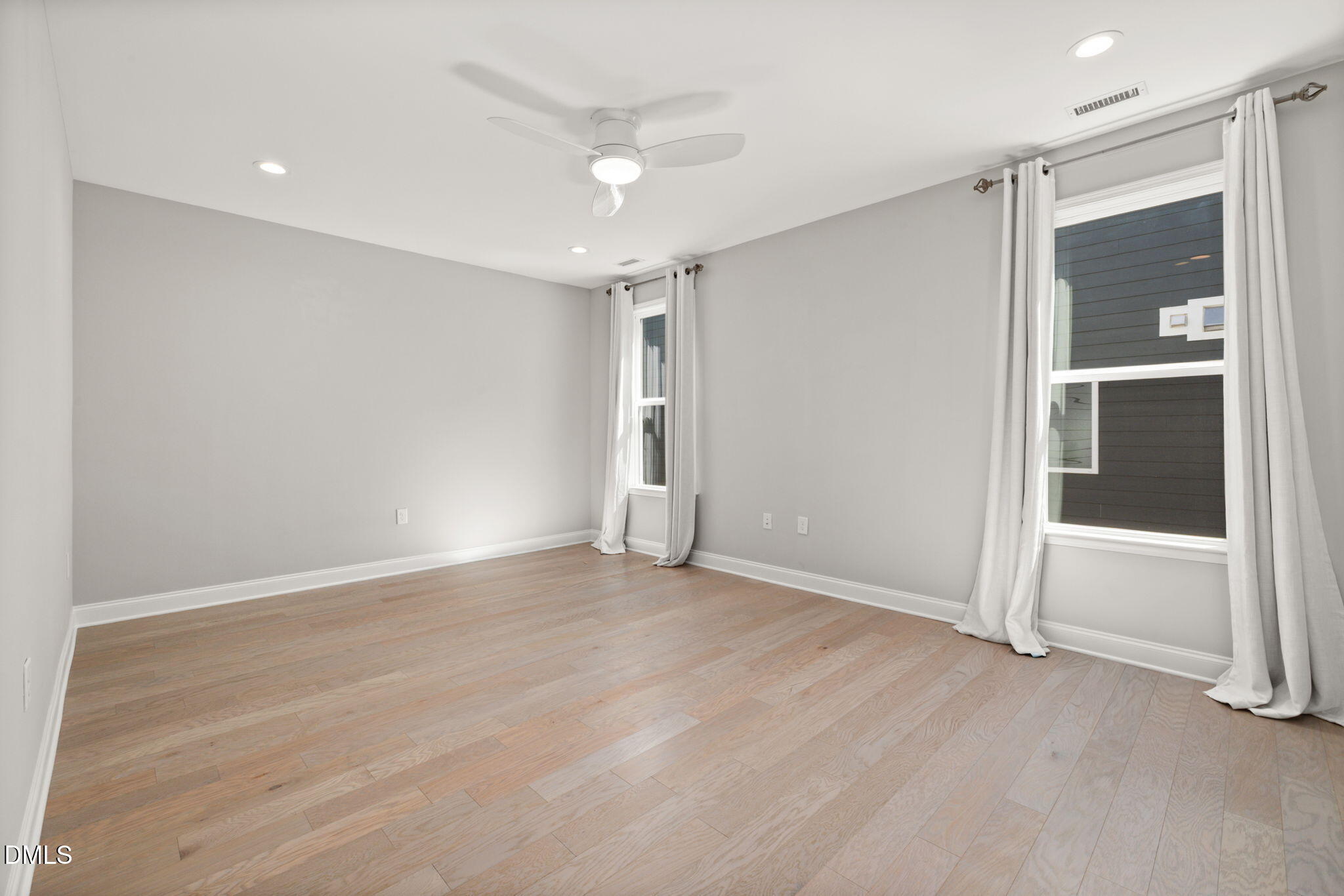 1015 Pondfield Way Durham, NC 27713 - Photo 22 of 48 an empty room with closet and windows