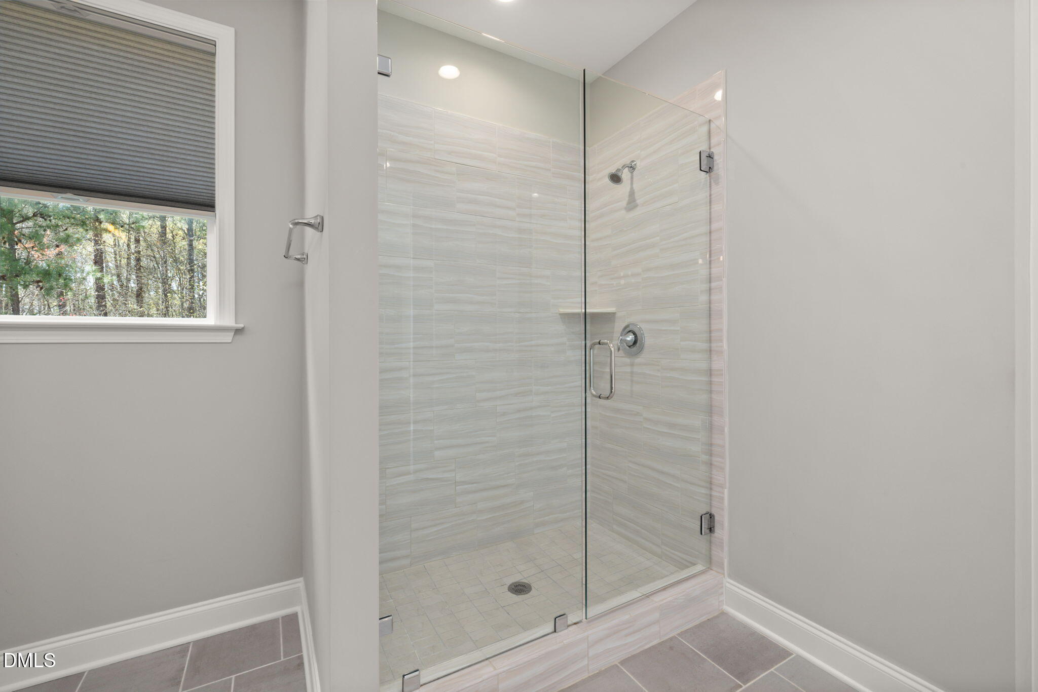 1015 Pondfield Way Durham, NC 27713 - Photo 26 of 48 a bathroom with a shower