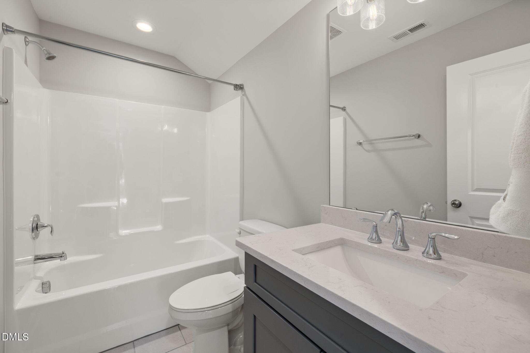 1015 Pondfield Way Durham, NC 27713 - Photo 36 of 48 a bathroom with a granite countertop sink a toilet and shower