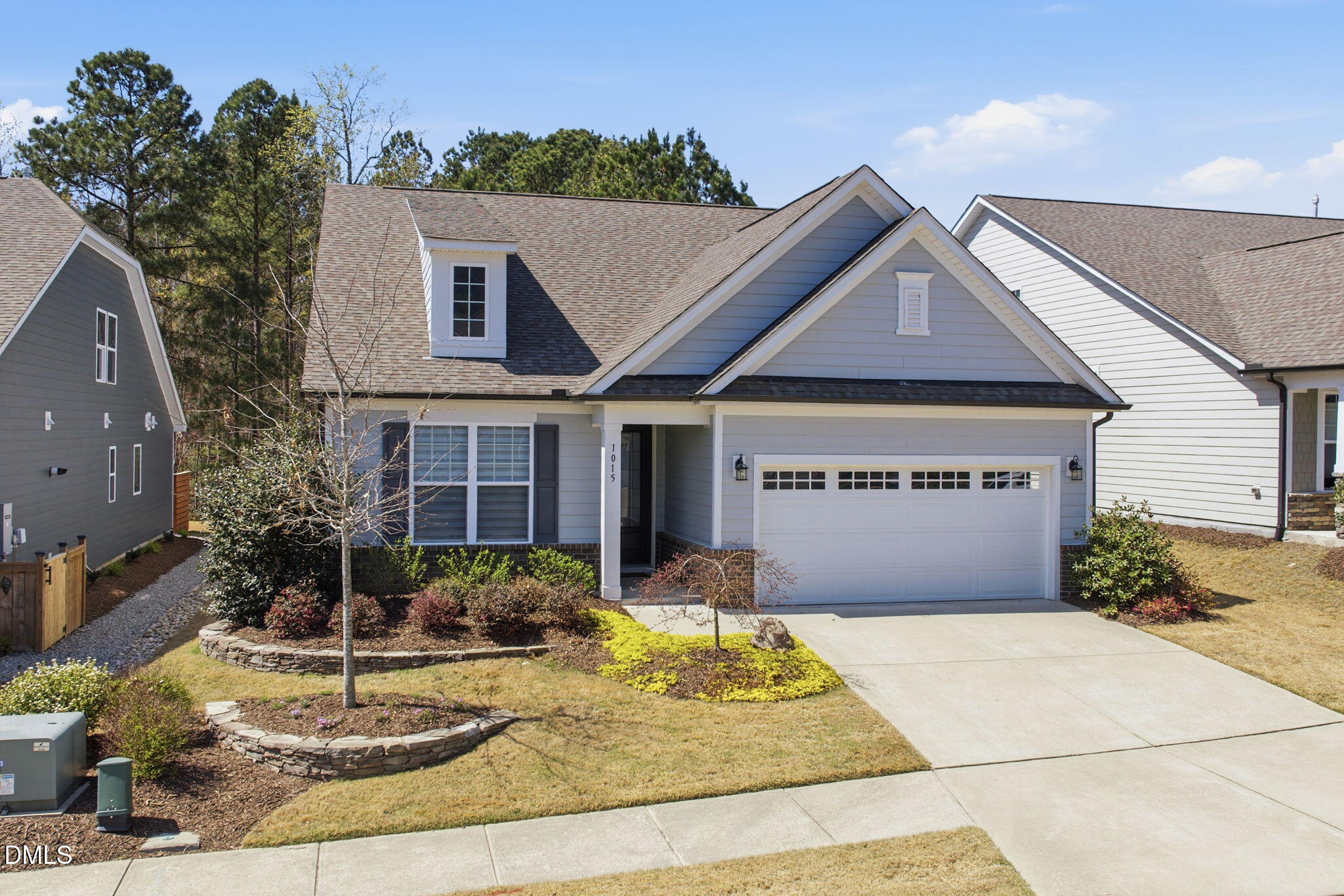 1015 Pondfield Way Durham, NC 27713 - Photo 3 of 48 a front view of a house with garden