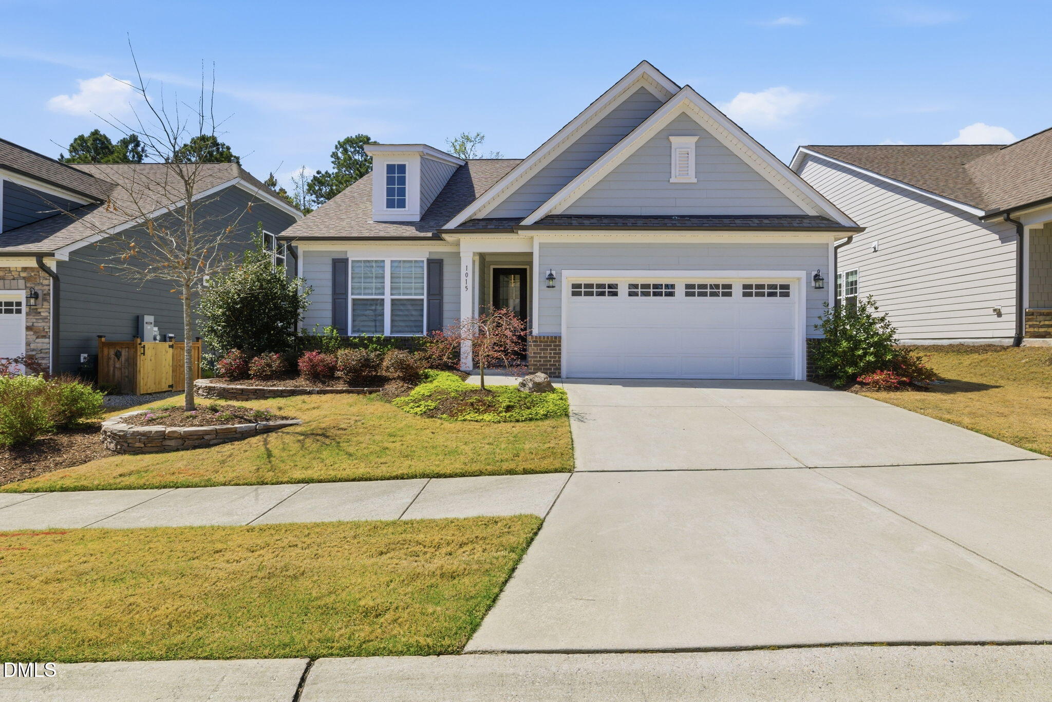 1015 Pondfield Way Durham, NC 27713 - Photo 5 of 48 a front view of a house with a yard