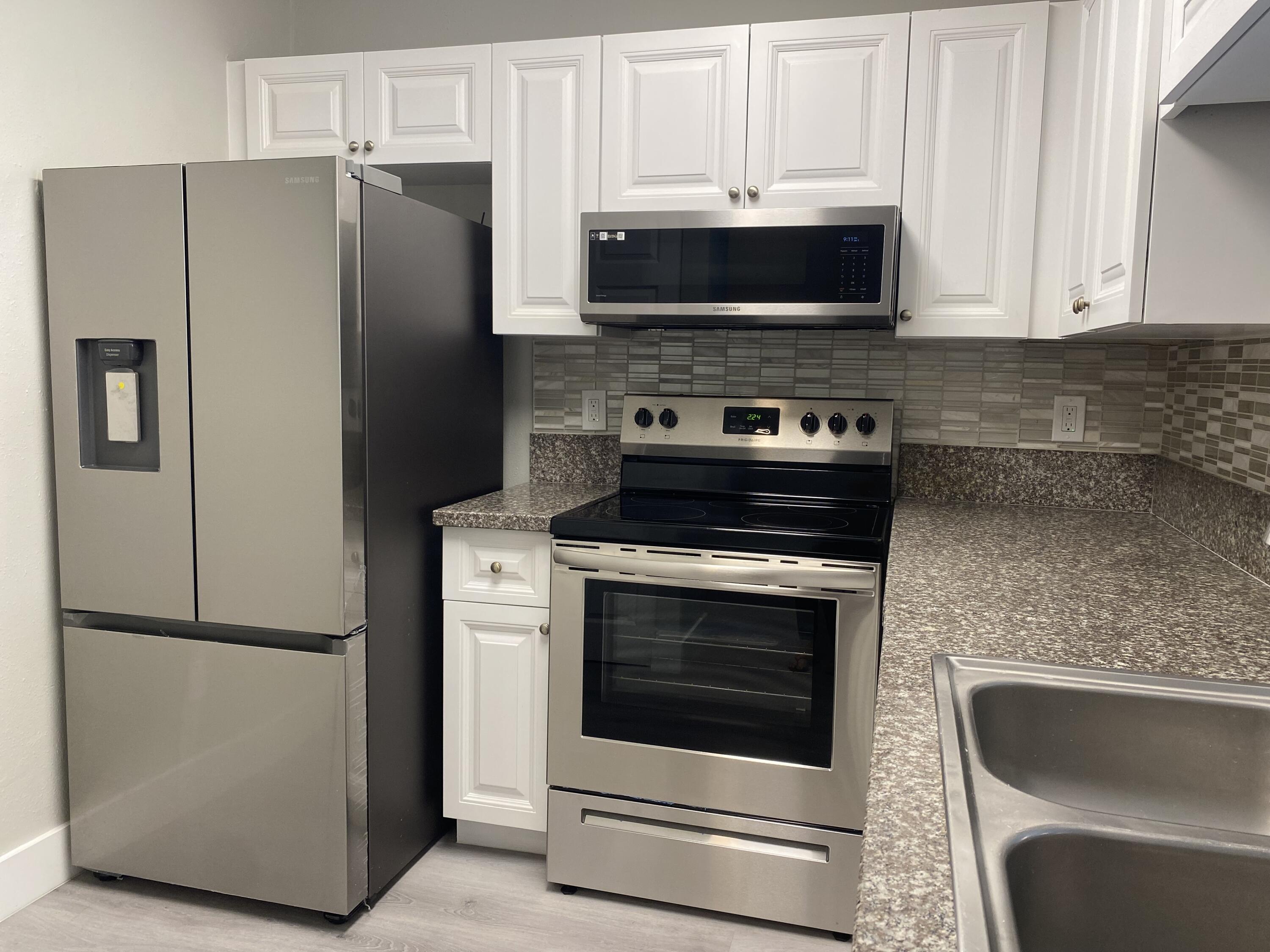 11432 Northwest 43rd Street, Unit TOP RIGHT Coral Springs, FL 33065 - Photo 4 of 30 IMG_3309