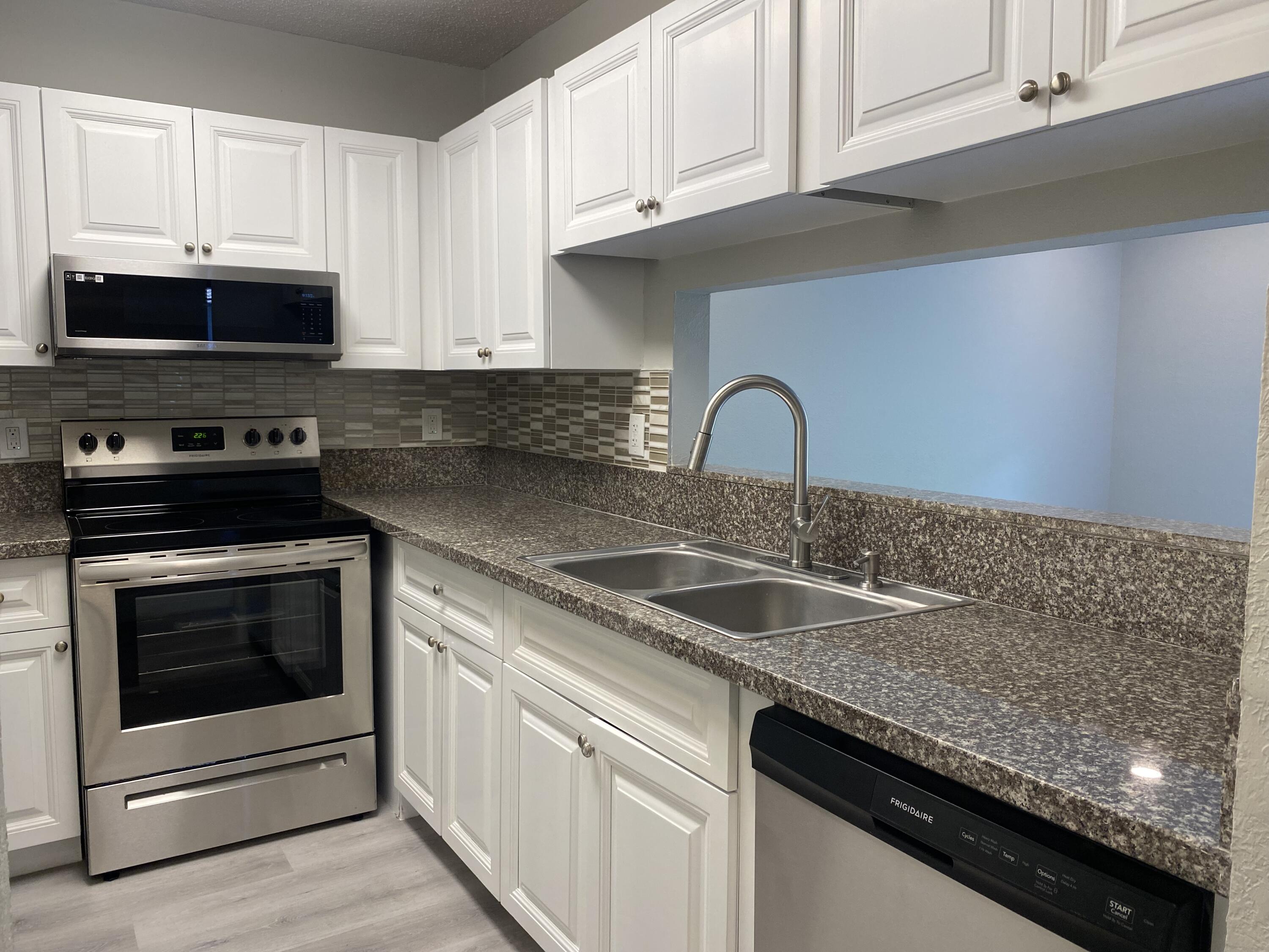 11432 Northwest 43rd Street, Unit TOP RIGHT Coral Springs, FL 33065 - Photo 7 of 30 IMG_3313