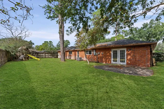 a view of a house with a park