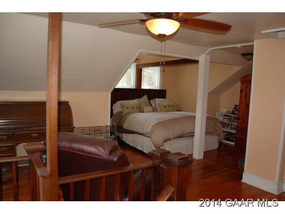 356 Lofton Road Raphine, VA 24472 - Photo 11 of 36 a bedroom with a bed and a night stand