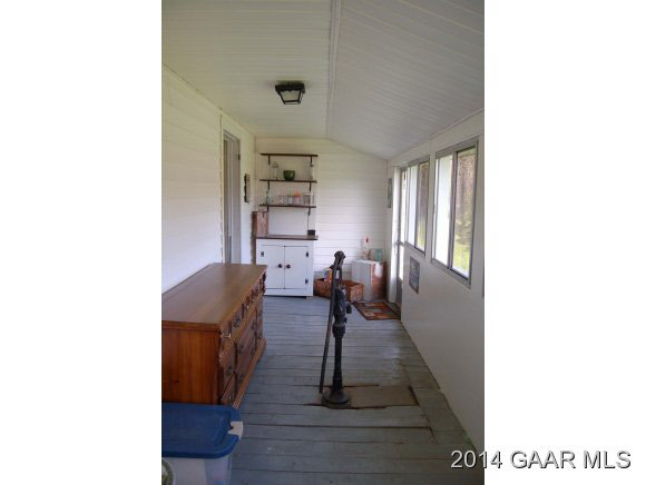 356 Lofton Road Raphine, VA 24472 - Photo 19 of 36 a living room with furniture and a table