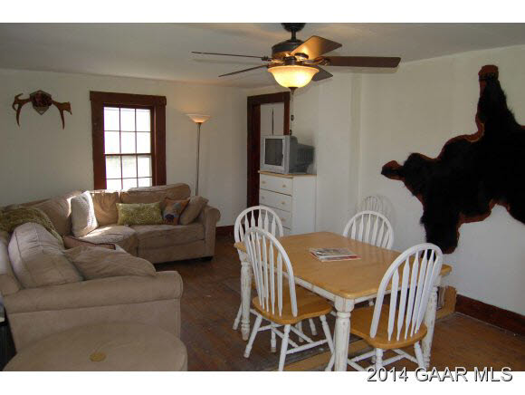 356 Lofton Road Raphine, VA 24472 - Photo 24 of 36 a living room with furniture and a window