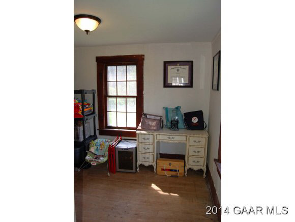 356 Lofton Road Raphine, VA 24472 - Photo 25 of 36 a living room with furniture and a fireplace