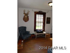 356 Lofton Road Raphine, VA 24472 - Photo 26 of 36 a living room with furniture and a window