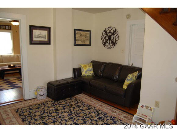 356 Lofton Road Raphine, VA 24472 - Photo 8 of 36 a living room with furniture and a lamp