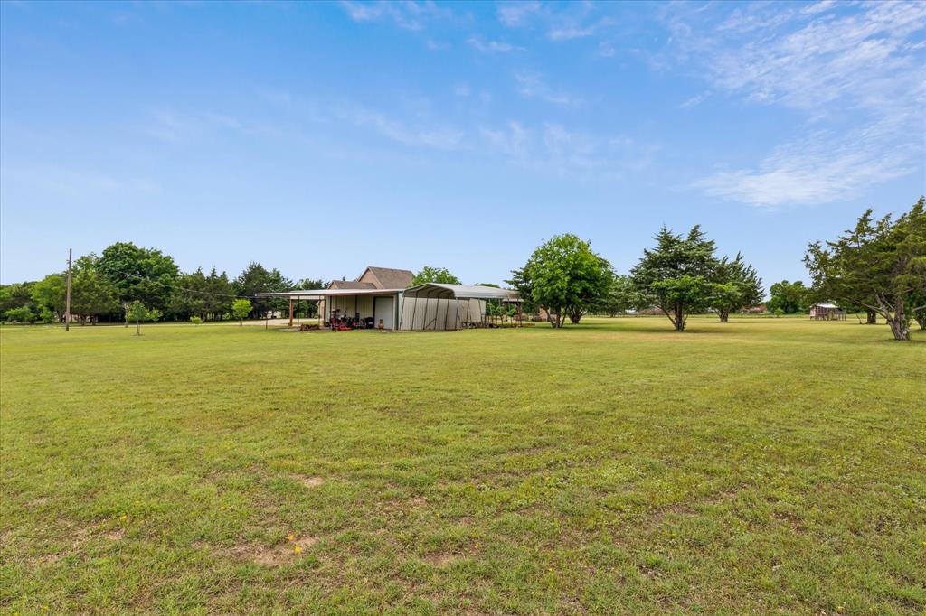 6251 Hayes Road Midlothian, TX 76065 - Photo 21 of 30 a view of an ocean from a yard