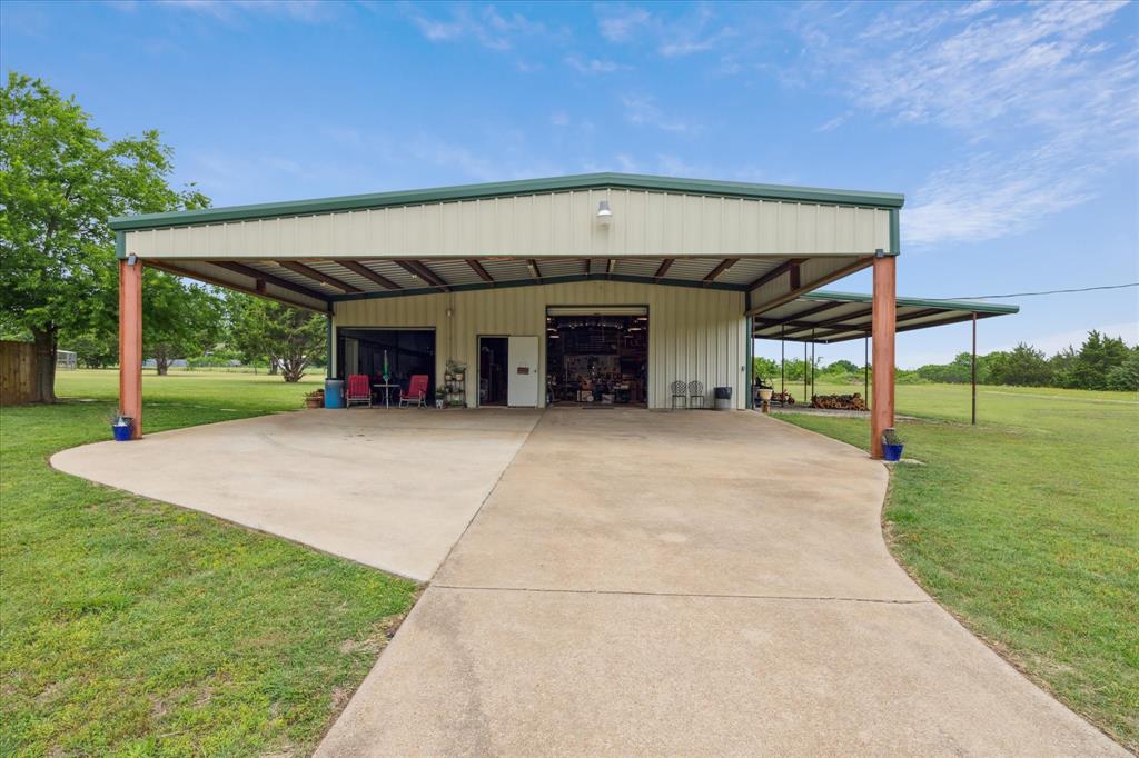 6251 Hayes Road Midlothian, TX 76065 - Photo 29 of 30 a view of a house with a yard