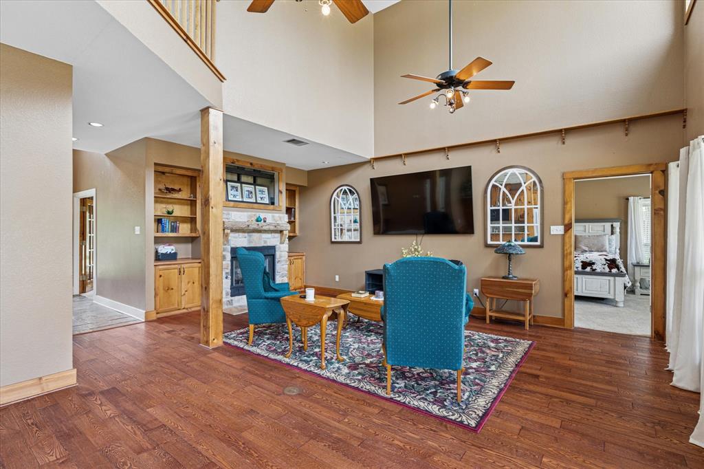 6251 Hayes Road Midlothian, TX 76065 - Photo 30 of 30 a living room with furniture and a flat screen tv