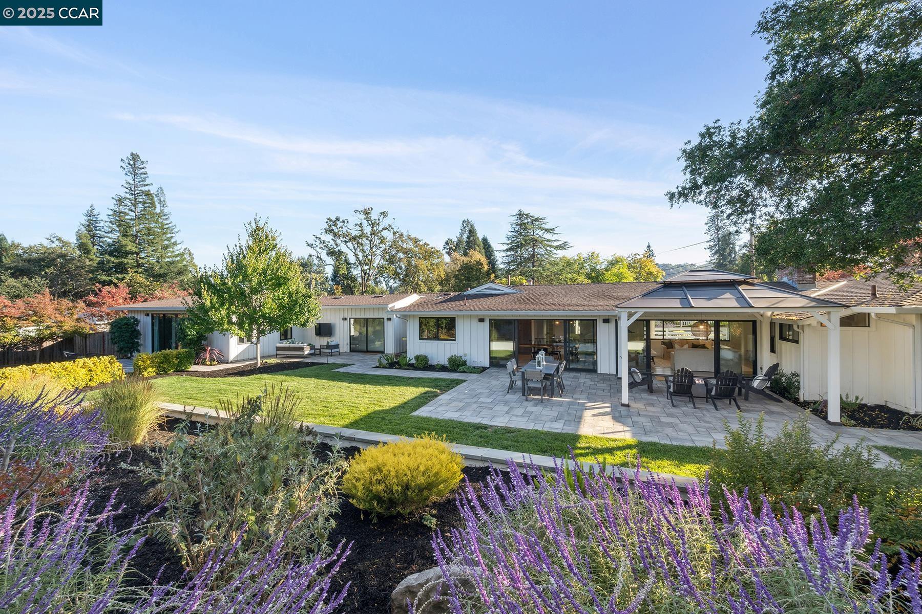a view of a swimming pool with a patio