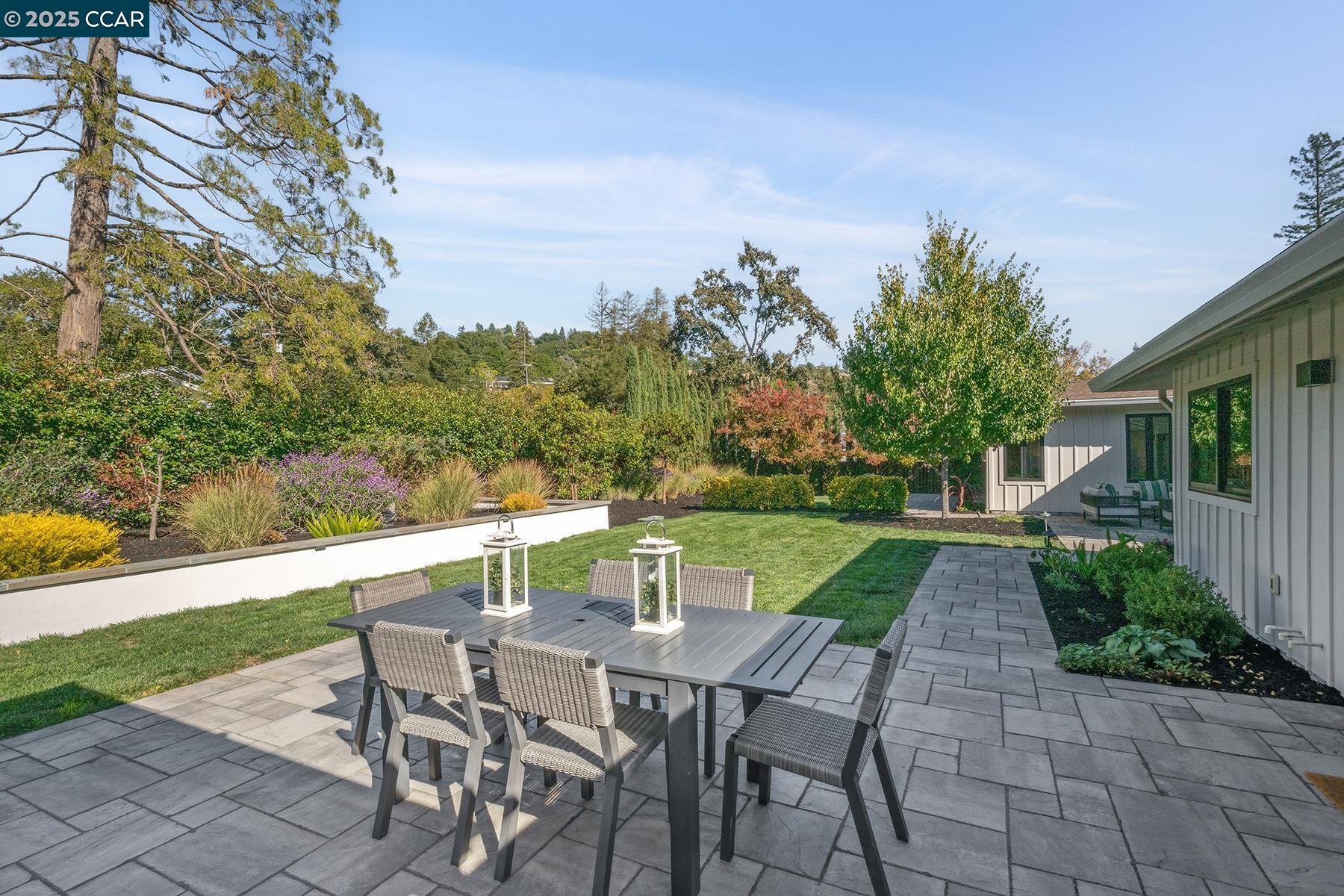 3958 Franke Lane Lafayette, CA 94549 - Photo 13 of 44 a view of an chairs and table on the patio