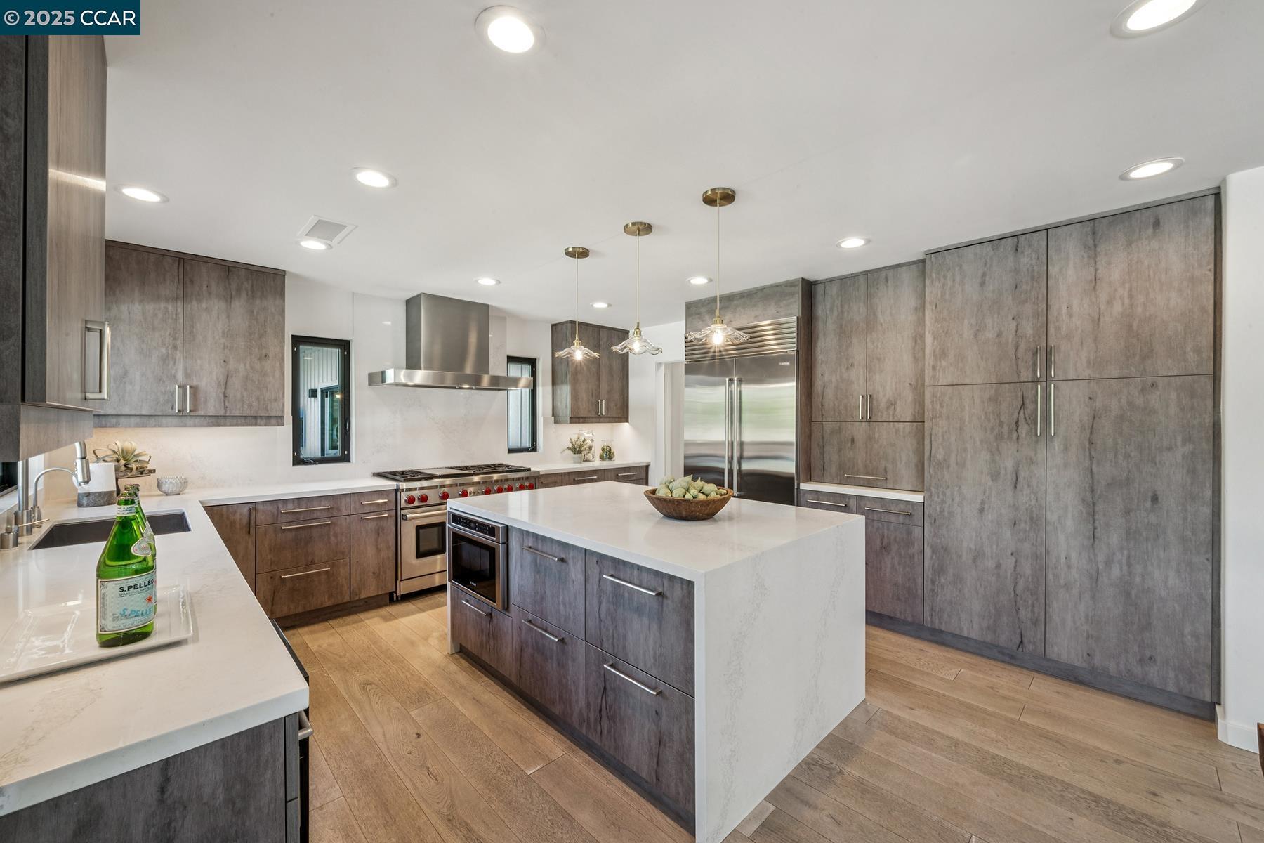 3958 Franke Lane Lafayette, CA 94549 - Photo 16 of 44 a kitchen with a sink stove and wooden cabinets