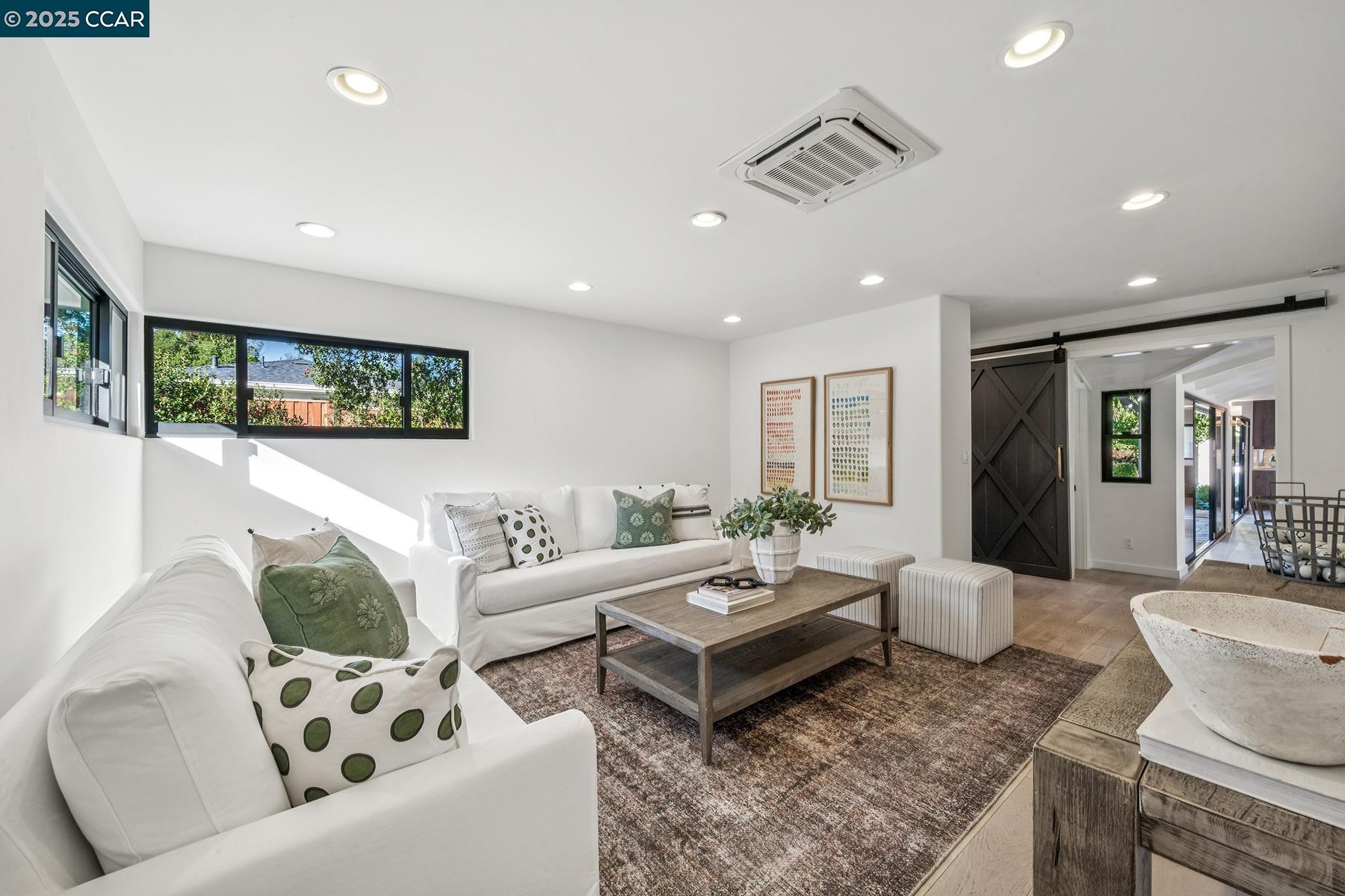 3958 Franke Lane Lafayette, CA 94549 - Photo 19 of 44 a living room with furniture and a large window