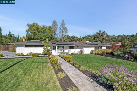 a view of a house with garden