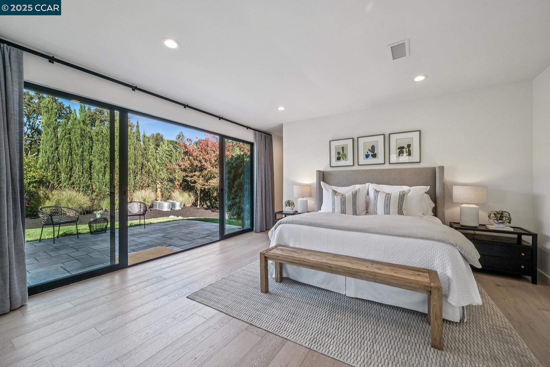 3958 Franke Lane Lafayette, CA 94549 - Photo 21 of 44 a spacious bedroom with a large bed and a large window