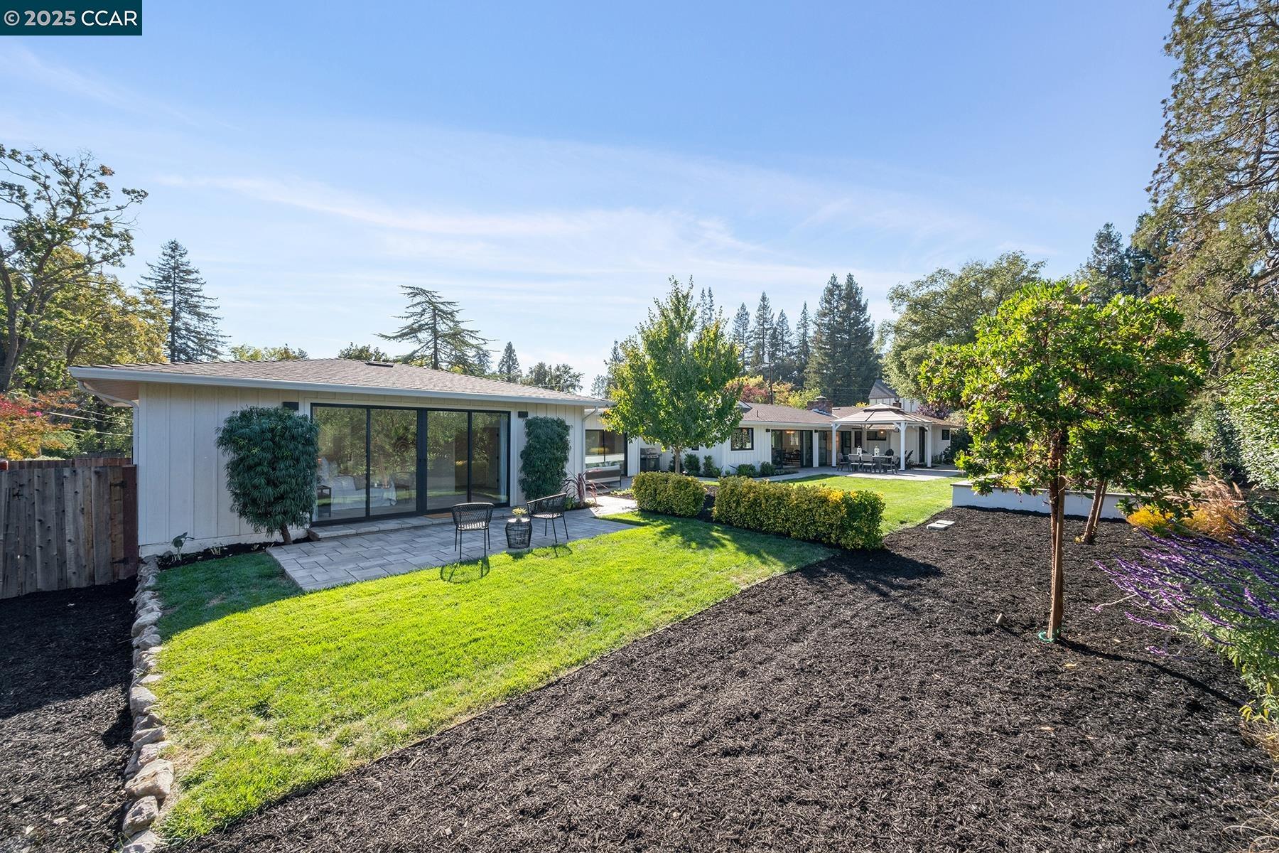 3958 Franke Lane Lafayette, CA 94549 - Photo 23 of 44 a view of a house with a yard porch and sitting area