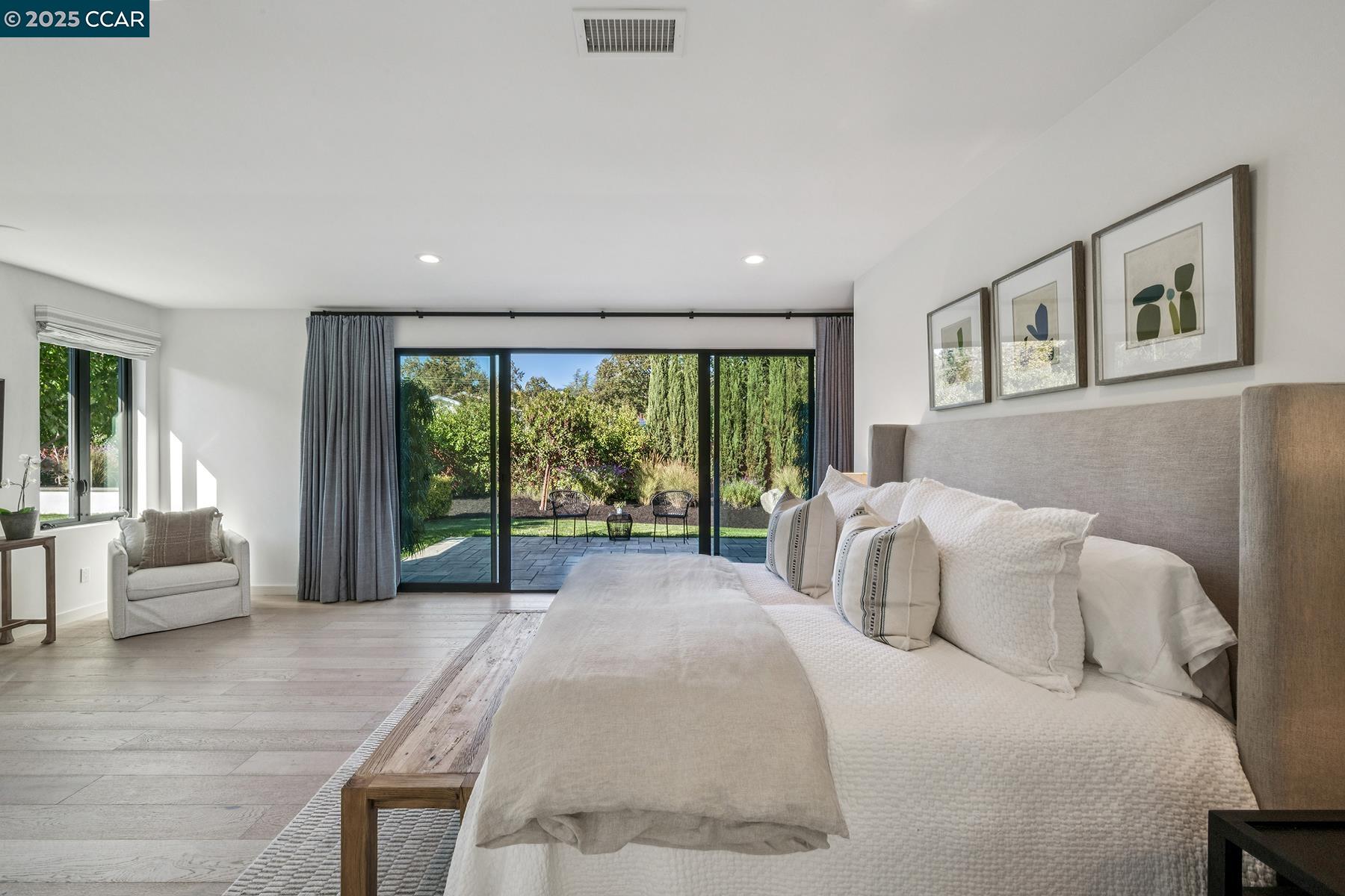 3958 Franke Lane Lafayette, CA 94549 - Photo 24 of 44 a bedroom with a large bed and a large window