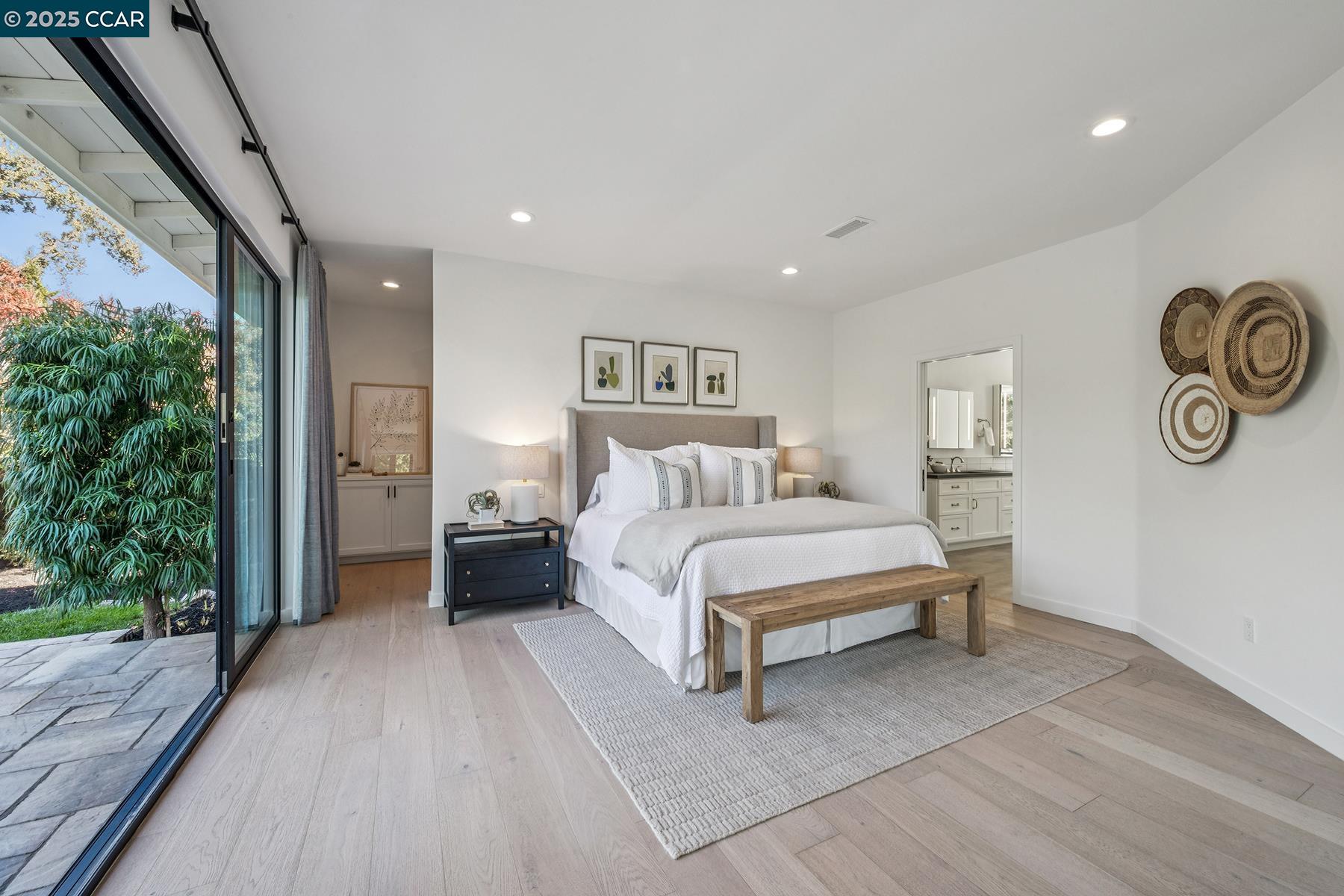 3958 Franke Lane Lafayette, CA 94549 - Photo 25 of 44 a spacious bedroom with a bed and a window