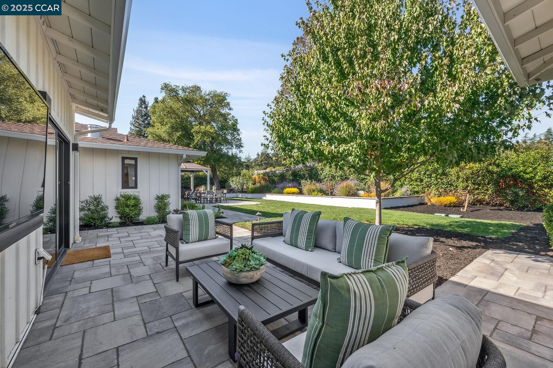 3958 Franke Lane Lafayette, CA 94549 - Photo 32 of 44 a view of house with outdoor seating and green space