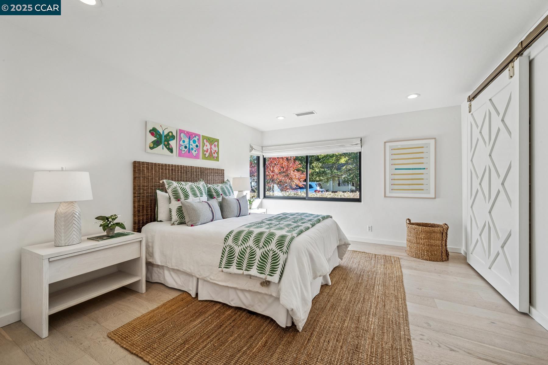 3958 Franke Lane Lafayette, CA 94549 - Photo 33 of 44 a bedroom with a bed and a couch