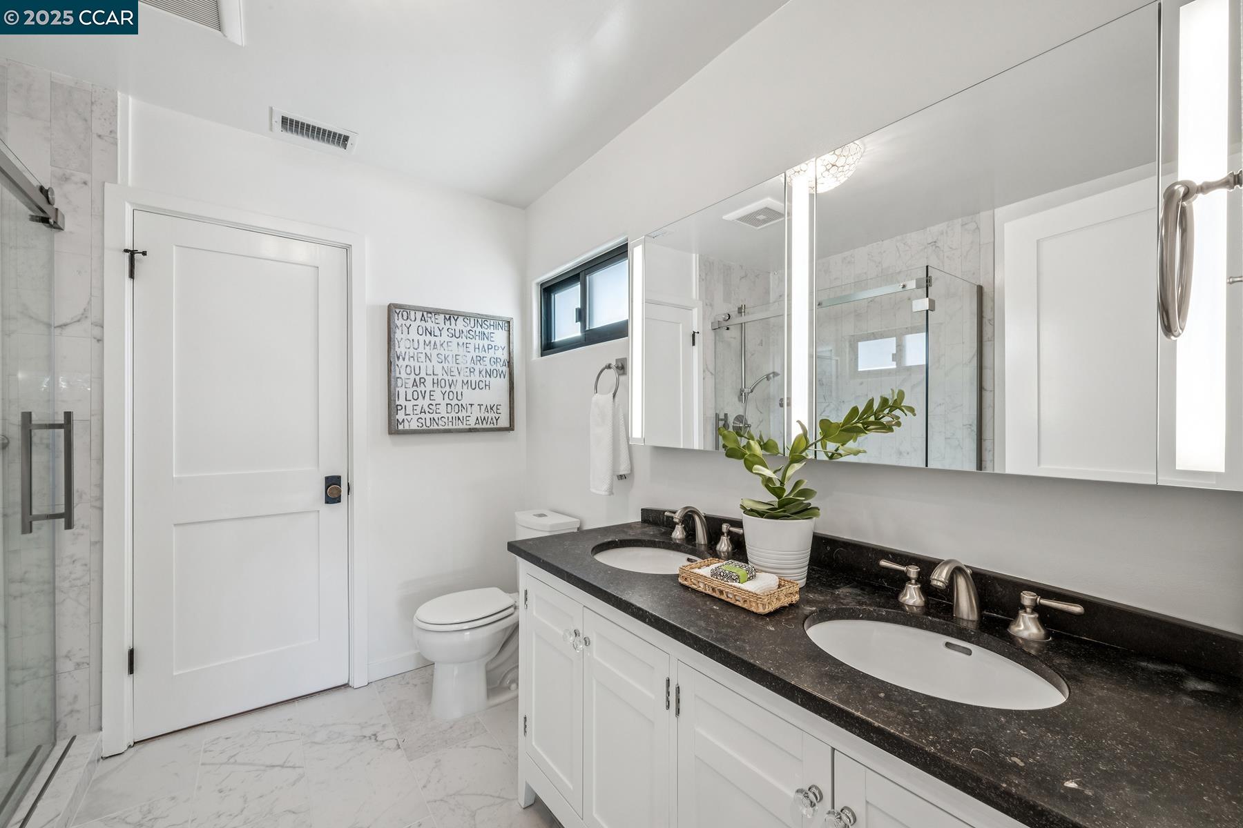 3958 Franke Lane Lafayette, CA 94549 - Photo 36 of 44 a bathroom with a granite countertop sink a toilet a large mirror and shower