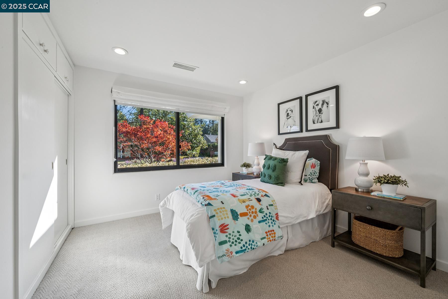 3958 Franke Lane Lafayette, CA 94549 - Photo 40 of 44 a bedroom with a bed and a window