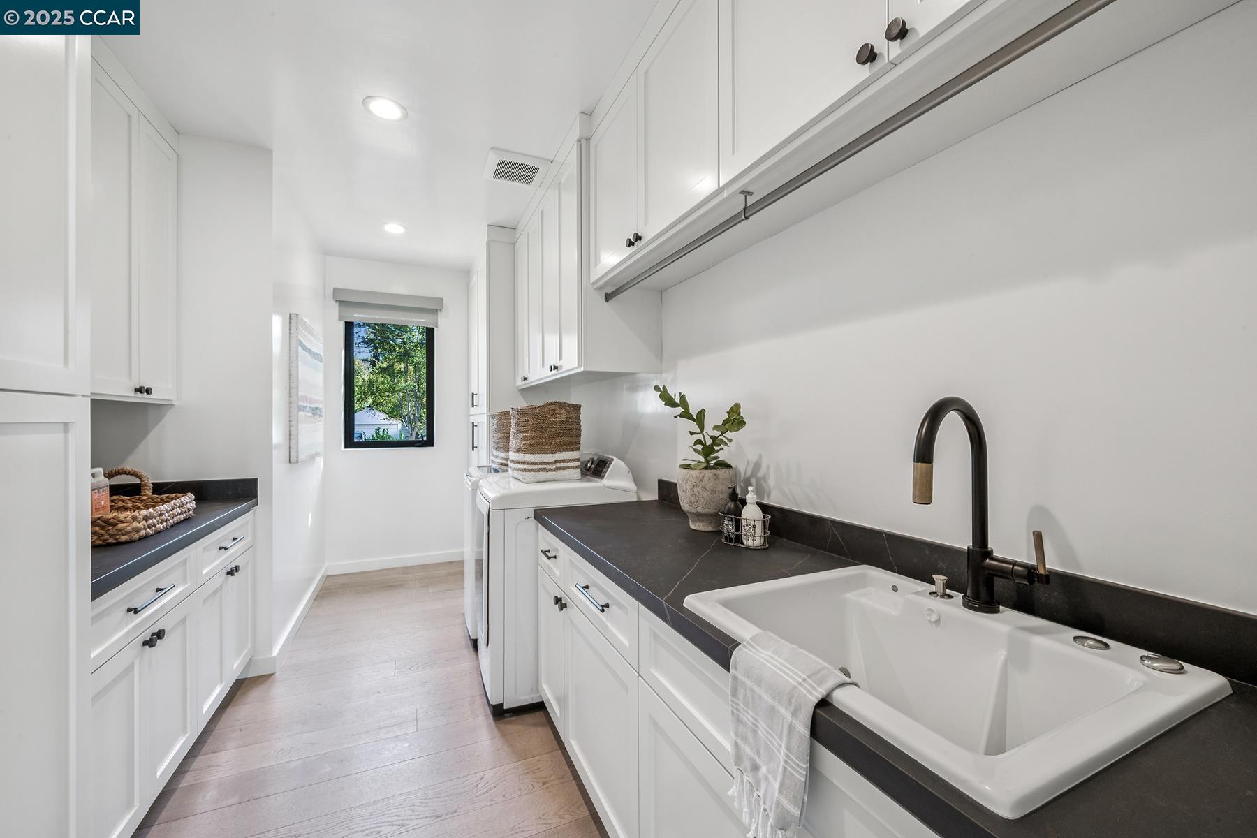 3958 Franke Lane Lafayette, CA 94549 - Photo 41 of 44 a kitchen with granite countertop a sink and white cabinets