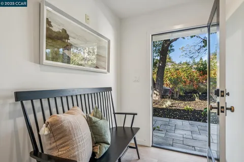 a view of a house with garden and a garden