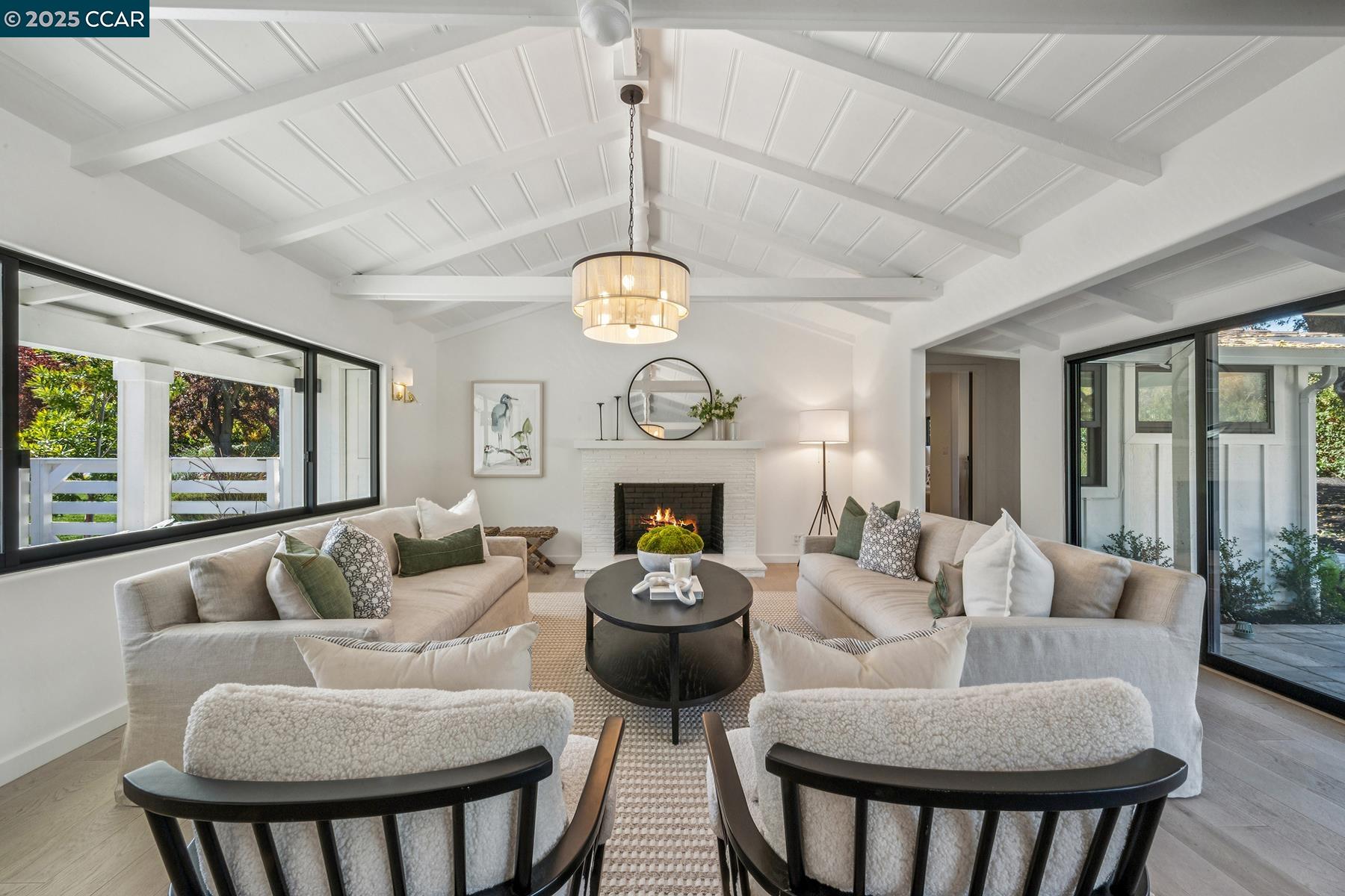 3958 Franke Lane Lafayette, CA 94549 - Photo 7 of 44 a living room with furniture a dining table and a clock