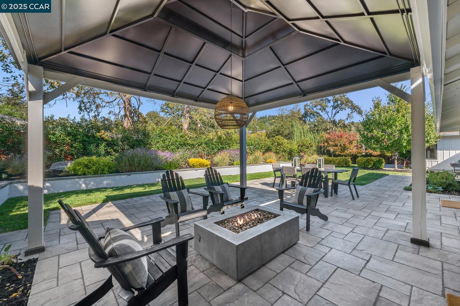 3958 Franke Lane Lafayette, CA 94549 - Photo 9 of 44 a patio with a table and chairs