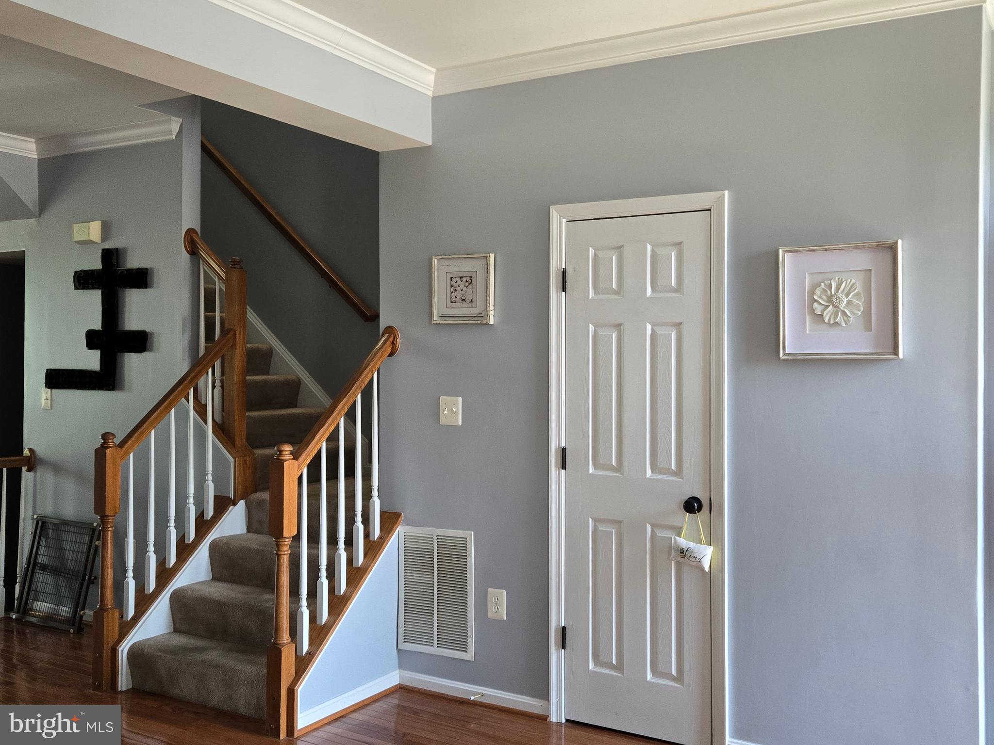73 Spoon Square Front Royal, VA 22630 - Photo 9 of 28 a view of entryway and hall with wooden floor
