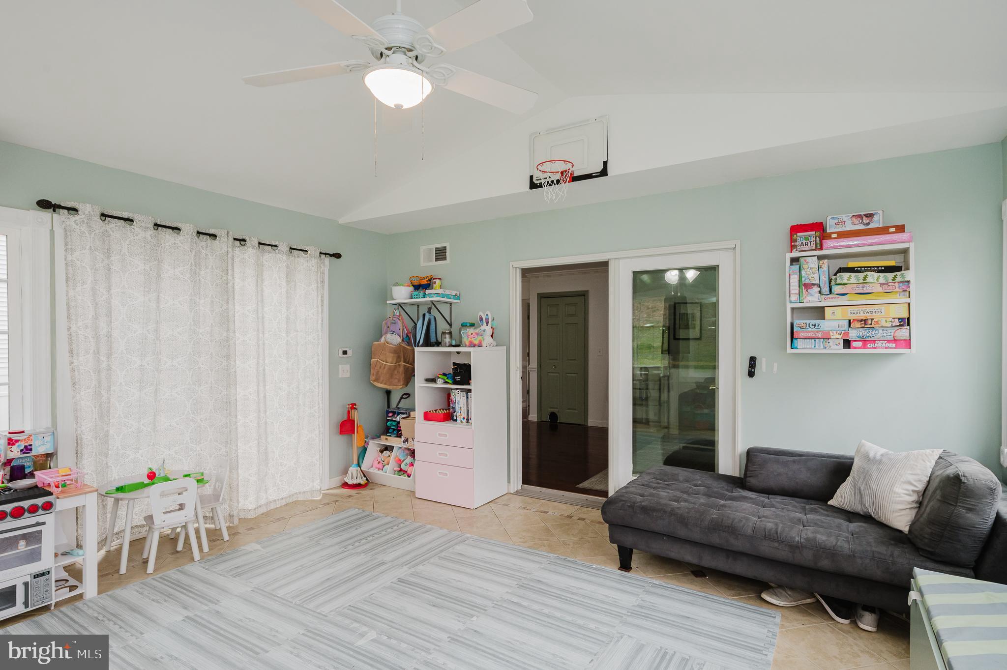 9528 Hallhurst Road Baltimore, MD 21236 - Photo 23 of 65 a living room with furniture and a wooden floor