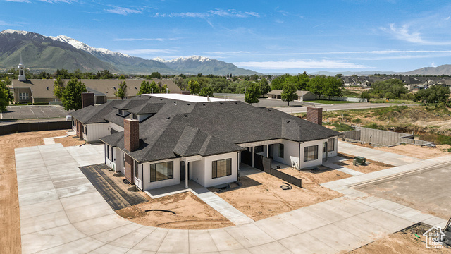 1631 West Century Lane, Unit B Mapleton, UT 84664 - Photo 30 of 33 Aerial view of residential area with a mountainous background
