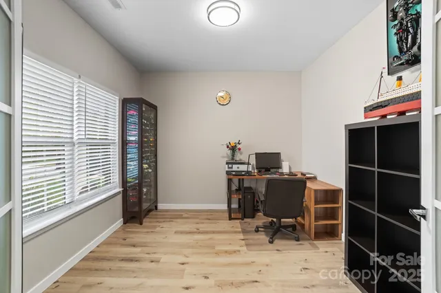 a workspace with furniture and a window