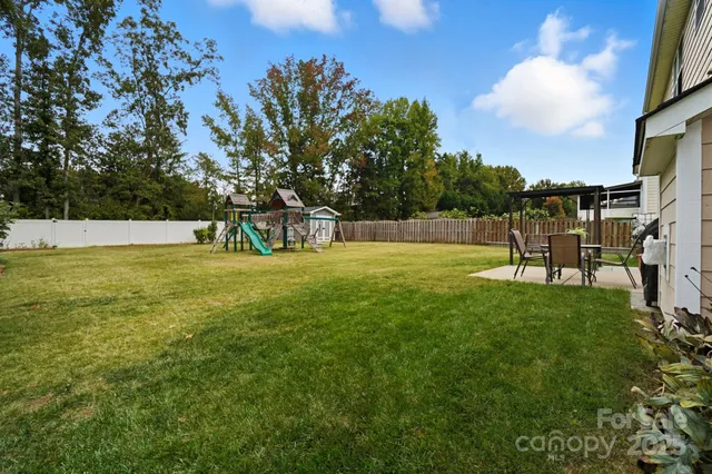 a view of a golf course with a swimming pool