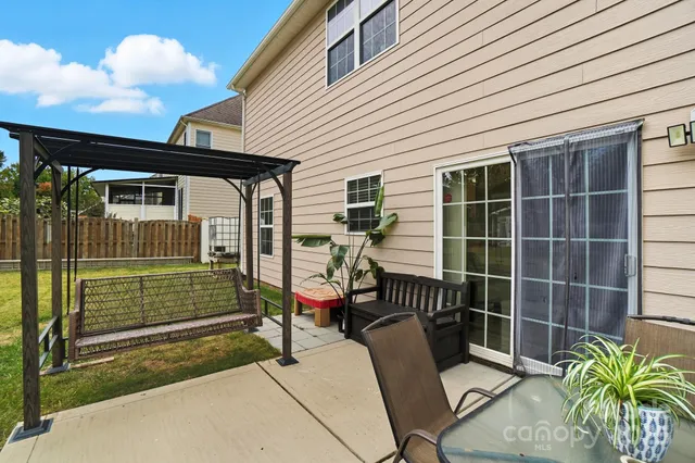 a view of chair and porch with furniture