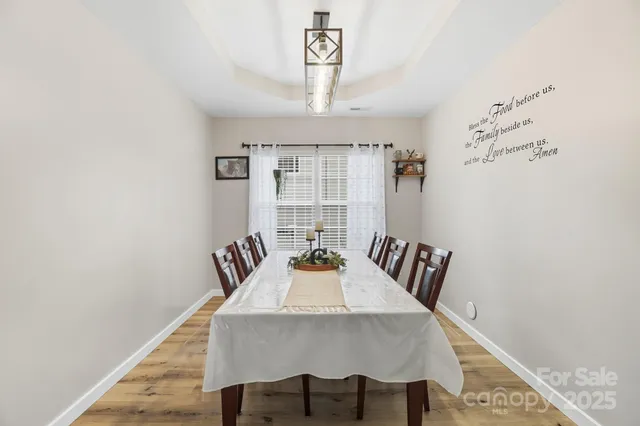 a view of a dining room with furniture