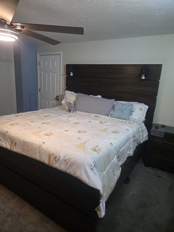 406 Lebanon Hill Road Southbridge, MA 01550 - Photo 19 of 36 a bed sitting in a bedroom and dresser