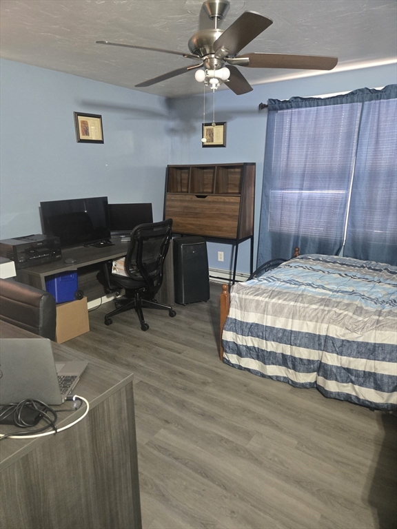 406 Lebanon Hill Road Southbridge, MA 01550 - Photo 21 of 36 a bedroom with a bed and a desk